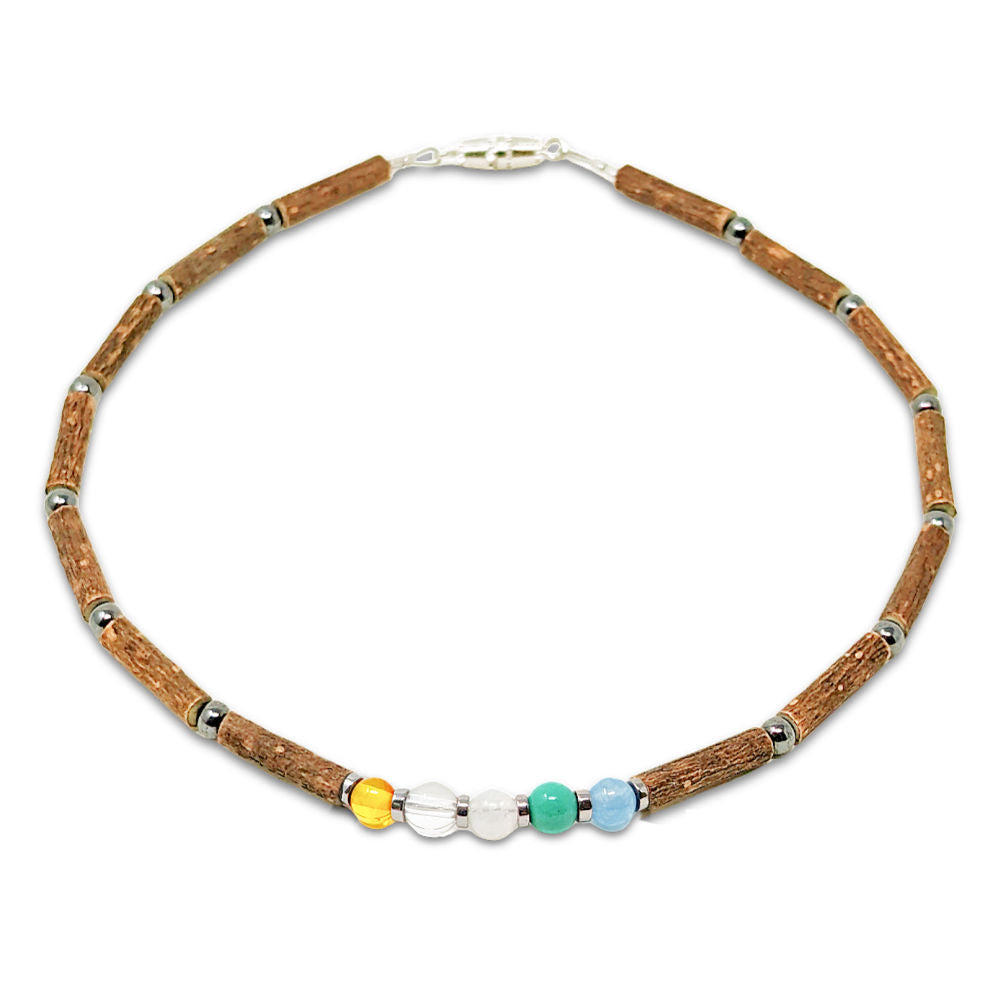 B75 | Collier bébé MAL DES TRANSPORTS en bois de noisetier