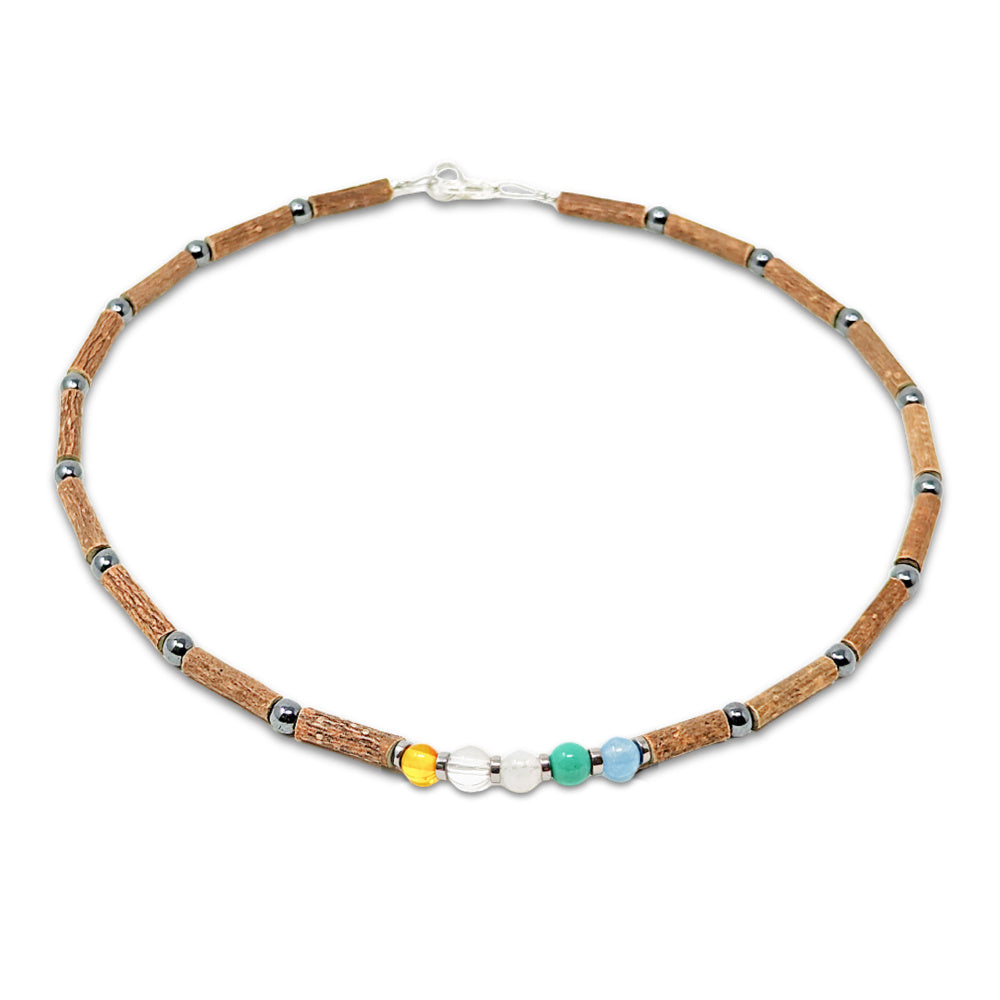 E75 | Collier enfant MAL DES TRANSPORTS en bois de noisetier