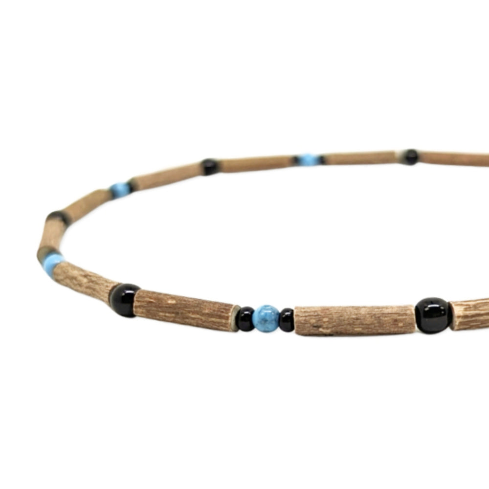 E11 | Bois de noisetier, turquoise et noir