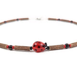 E19 | Hazel wood & red ladybug