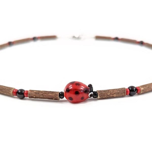E19 | Hazel wood & red ladybug
